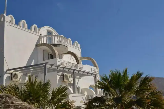 Black coast Santorini by GHH