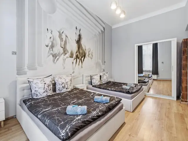 Queen Apartments