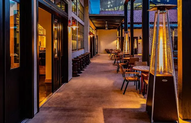 Texican Court, by Valencia Hotel Group