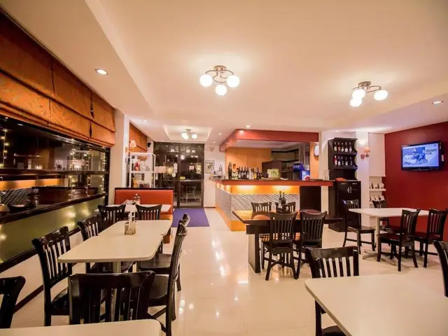 The Red Palm Suites And Restaurant