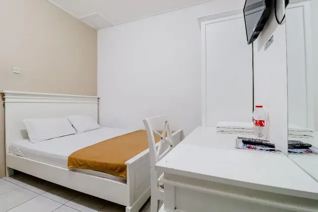 Ratu Guesthouse by ZUZU